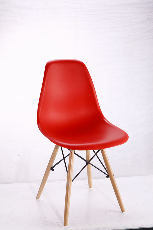 Plastic chair with wood legs