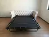Bi-fold sofa bed mechanism