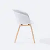 Customized plastic fabric cafe dining chairs with wood leg