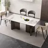 Modern minimalist stainless steel rock plate dining table and chairs